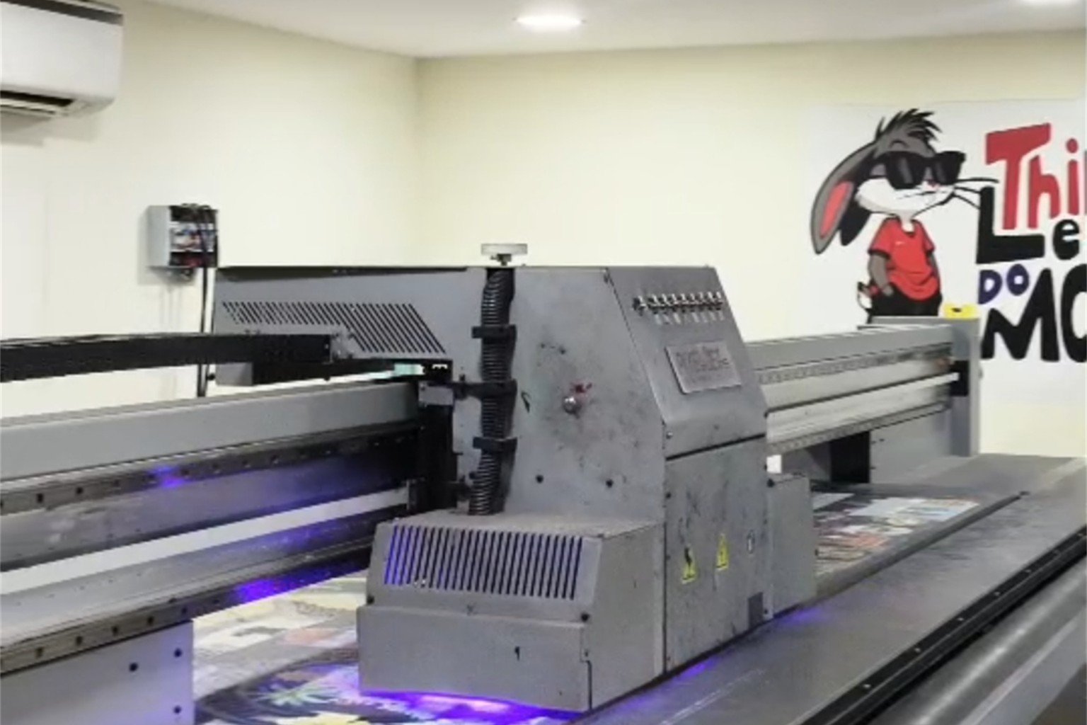 Pentacle's real UV flatbed printer producing a full-colour print